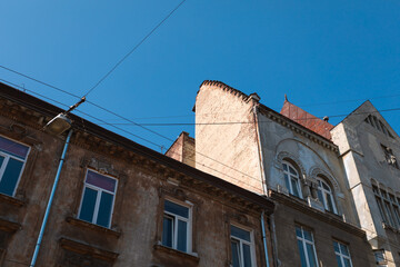 Historic architecture under the clear blue sky of Lviv, Ukraine during a sunny afternoon