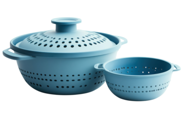 Pastel blue kitchen tools for healthy meal prep a versatile set ensuring effortless draining on a dark background.