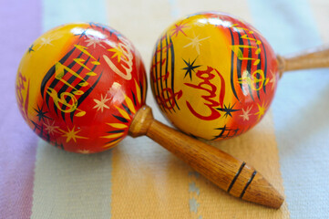 Cuban maracas on colorful fabric, capturing the spirit of Latin music