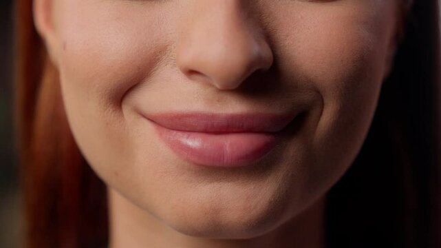 Cropped view macro extreme close up female plump lips woman girl businesswoman business details lip Caucasian skin care medical plastic surgery health cosmetology make-up smiling sexy seductive smile