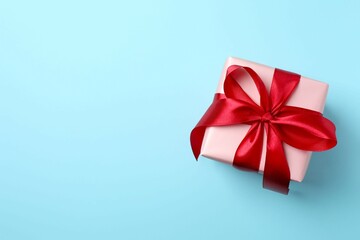 Beautiful gift box on color background