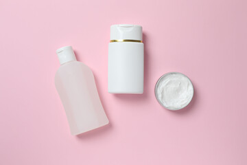 Natural cosmetic products a pink background, top view