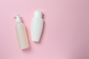 Natural cosmetic products a pink background, top view