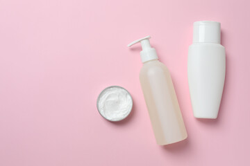 Natural cosmetic products a pink background, top view