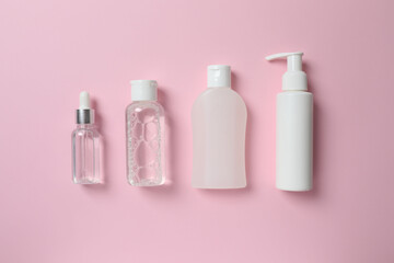 Natural cosmetic products a pink background, top view