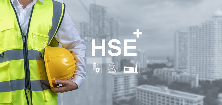 HSE, Health safety environment concept, Standard safe industrial work and industrial, Engineer Standing holding a hat with the HSE letter icon, Safety and protection in industrial work, Accident.