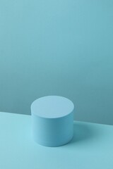 Blue podium on a blue background