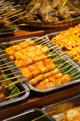 Assorted Indonesian satay, captured on April 8, 2025. Grilled skewered meats served with traditional sauces, offering rich and authentic flavors