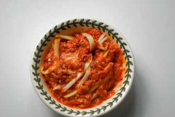 Mango Sambal (a Spicy Mango Relish). Usually eaten together with rice during lunch or dinner.