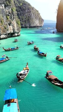 Tourist relaxing on Longtail boats at Koh Phi Phi Don island in Ao Nang, Krabi, Thailand.
