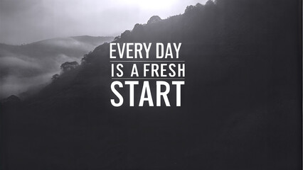 Inspirational quote on fresh start against a misty mountain background