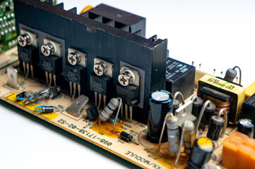 Electronic printed circuit board on white background close-up