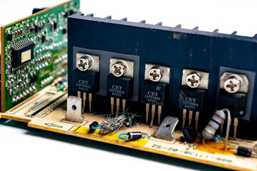 Electronic printed circuit board on white background close-up