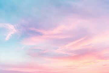 Obraz premium A breathtaking pastel sunset paints the sky with soft hues of pink and blue, a dreamy, ethereal spectacle of nature's artistry.