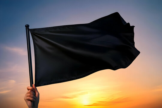 A silhouette of a hand holding a black flag against a vibrant sunset, symbolizing protest and unity in the face of challenges.