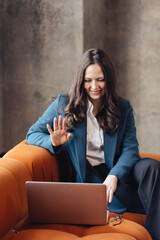 Friendly Video Call &ndash; Woman Communicating Online via Laptop