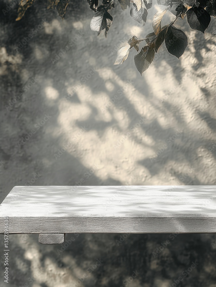 Poster rustic wooden table against textured wall with dappled sunlight and leaves creating a serene and nat