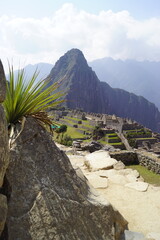 Stunning views over the old historic ruins of Machu Picchu in the Andes Mountains cloud forests of Peru
