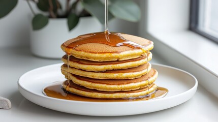 Delicious Stack of Fluffy Pancakes Drizzled with Sweet Maple Syrup