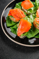 Salmon sandwich red fish seafood appetizer dish fresh tasty gourmet food background on table rustic food top view copy space pescetarian diet