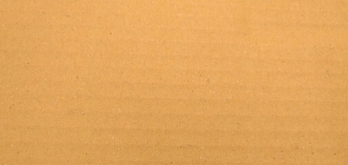Background of brown kraft paper or cardboard texture. Abstract pattern of beige rough carton, old paper sheet, 
