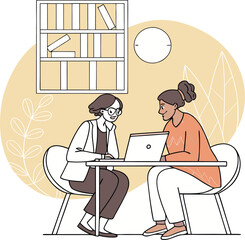 Two Women Working Together on a Laptop