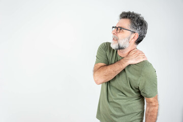 Fototapeta premium Middle aged man has shoulder pain. with copy space for text. Caucasian handsome man over isolated background suffering from pain in shoulder for having made an effort
