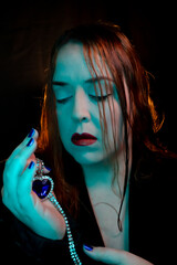 Model with makeup similar to a character from a period film.