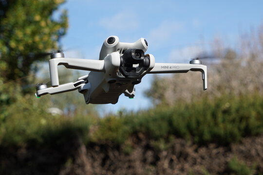 dji Mini 4 pro flying close-up detail. Drone, with excellent image quality and very light weight. horizontal image