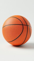 Fototapeta premium Orange basketball on a white background showcasing its texture and design in a studio setting for sports equipment photography