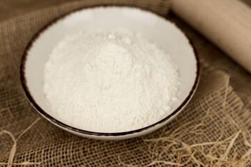 Baking utensils, flour and rolling pin. Flour. Preparation for baking