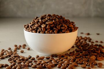 Warm and inviting aroma of freshly roasted coffee beans in a bowl