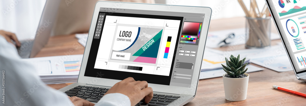 Poster Graphic designer software for modern design of web page and commercial brisk ads showing on the computer screen
