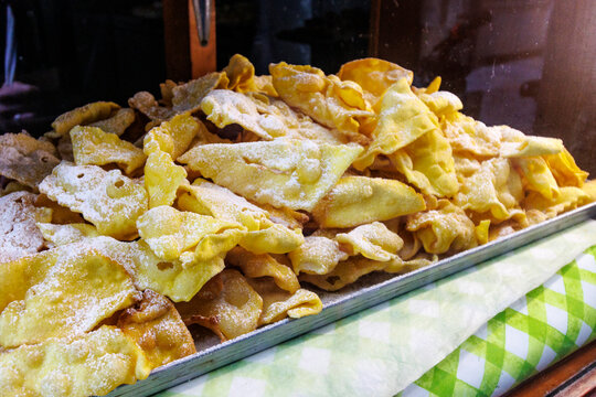 Handmade bugie pastry (Sweet carnival fritters made at Carnival time), a local delicacy in Turin, Piedmont, Italy, Europe