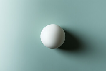 Minimal white ball on solid color background