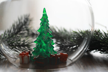 Festive Glass Ornament with Christmas Tree and Gifts