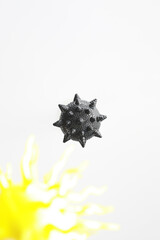 Abstract Spiky Black Object in White Space with Yellow Accent Background