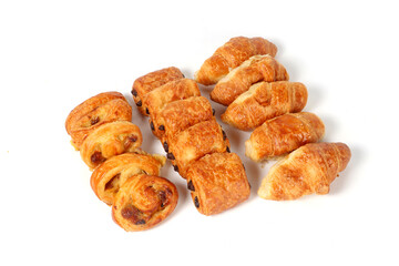 Assortment of French pastries, including croissants, pain au chocolat, and pain aux raisins,...