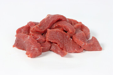 Close-up of raw sliced beef, showing fresh red meat texture and marbling