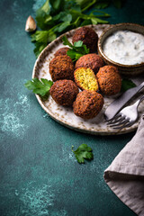 Middle Eastern falafel balls with sauce