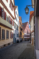 Scenic cobblestone back alley in the old town of Tübingen in Southern Germany
