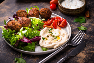 Salad with hummus, falafel and vegetables