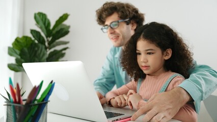 Caucasian father teaching attractive daughter about coding engineering prompt while american school...