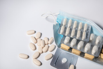 ablets against influenza virus and amino acids. Protective medical mask. Medicine