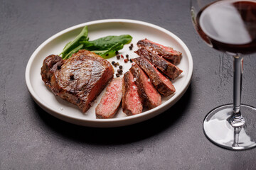 A perfectly cooked sliced striploin steak with a juicy, tender texture