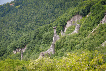 Rock formations, also known as fairy chimneys, earth pyramids, hoodoos, Piramidi di Zone, Italy