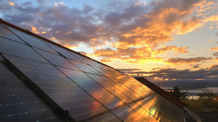 solar panels on the roof at sunset © Dvid