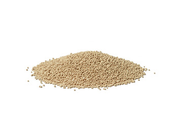 Macro photo of nutritional yeast texture on white background