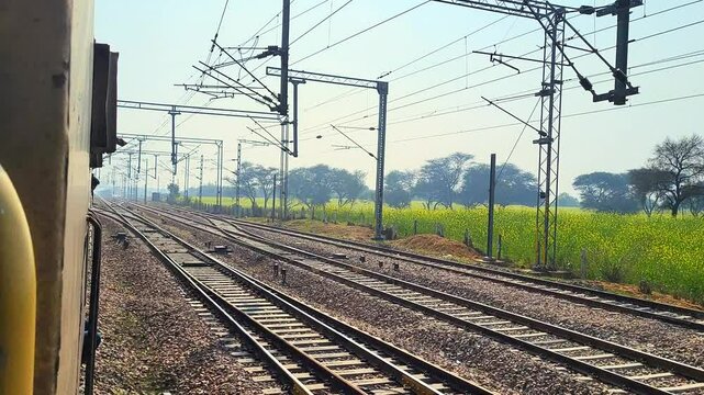 Moving Train and Electric Poles indian Railway Infrastructure in Motion