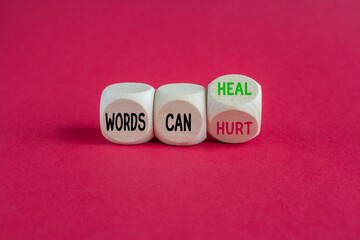 Turned a wooden cube and changes the expression Words can hurt to Words can heal. Beautiful red...